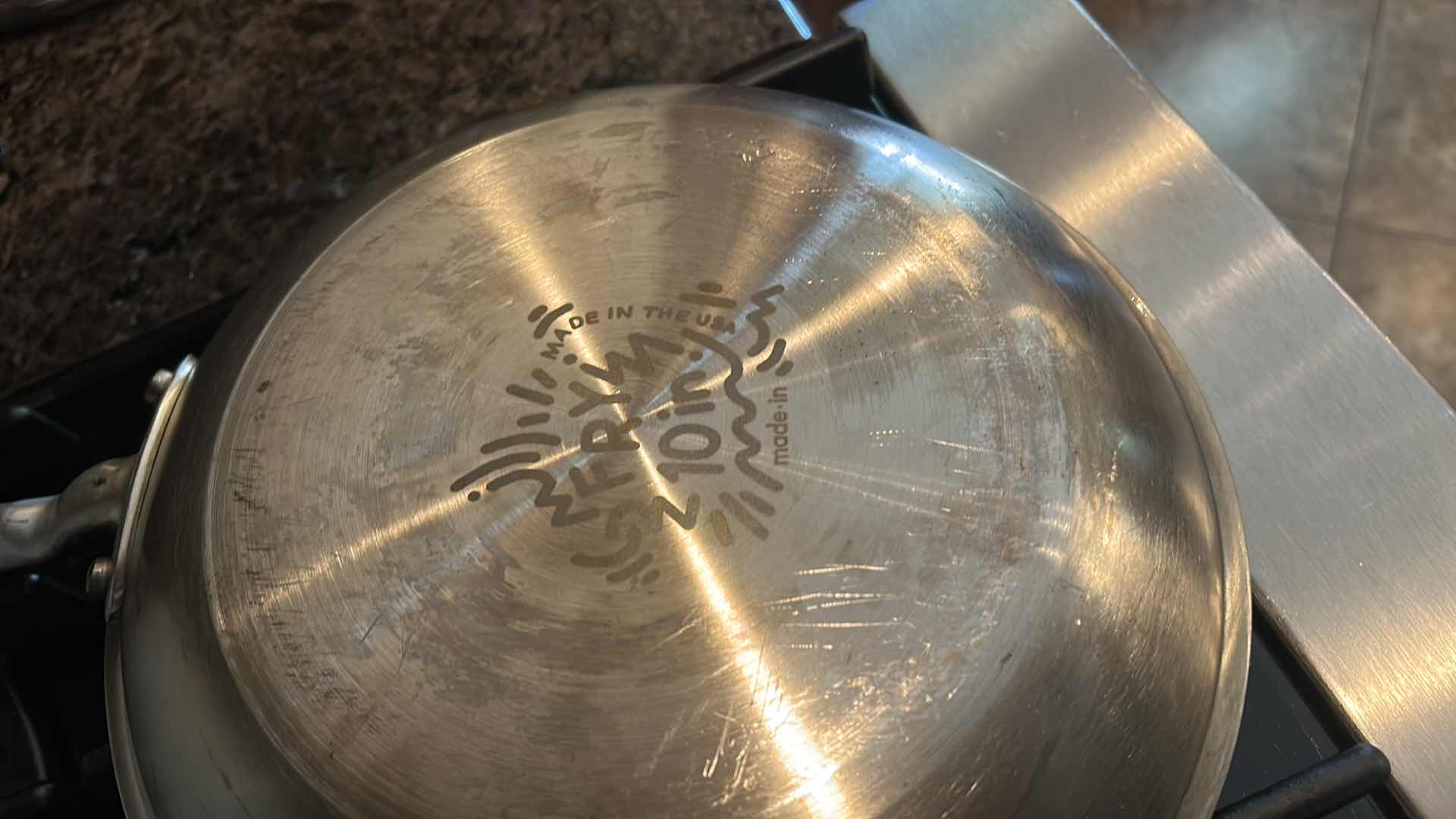 Photo 1 of 3 EMERIL SKILLETS AND 4 OIL SPATTER COVERS