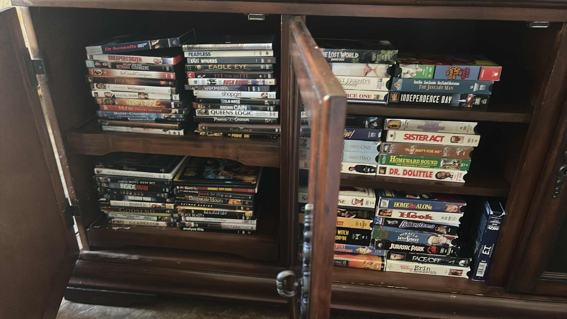 Photo 1 of COLLECTION OF VHS AND DVD MOVIES