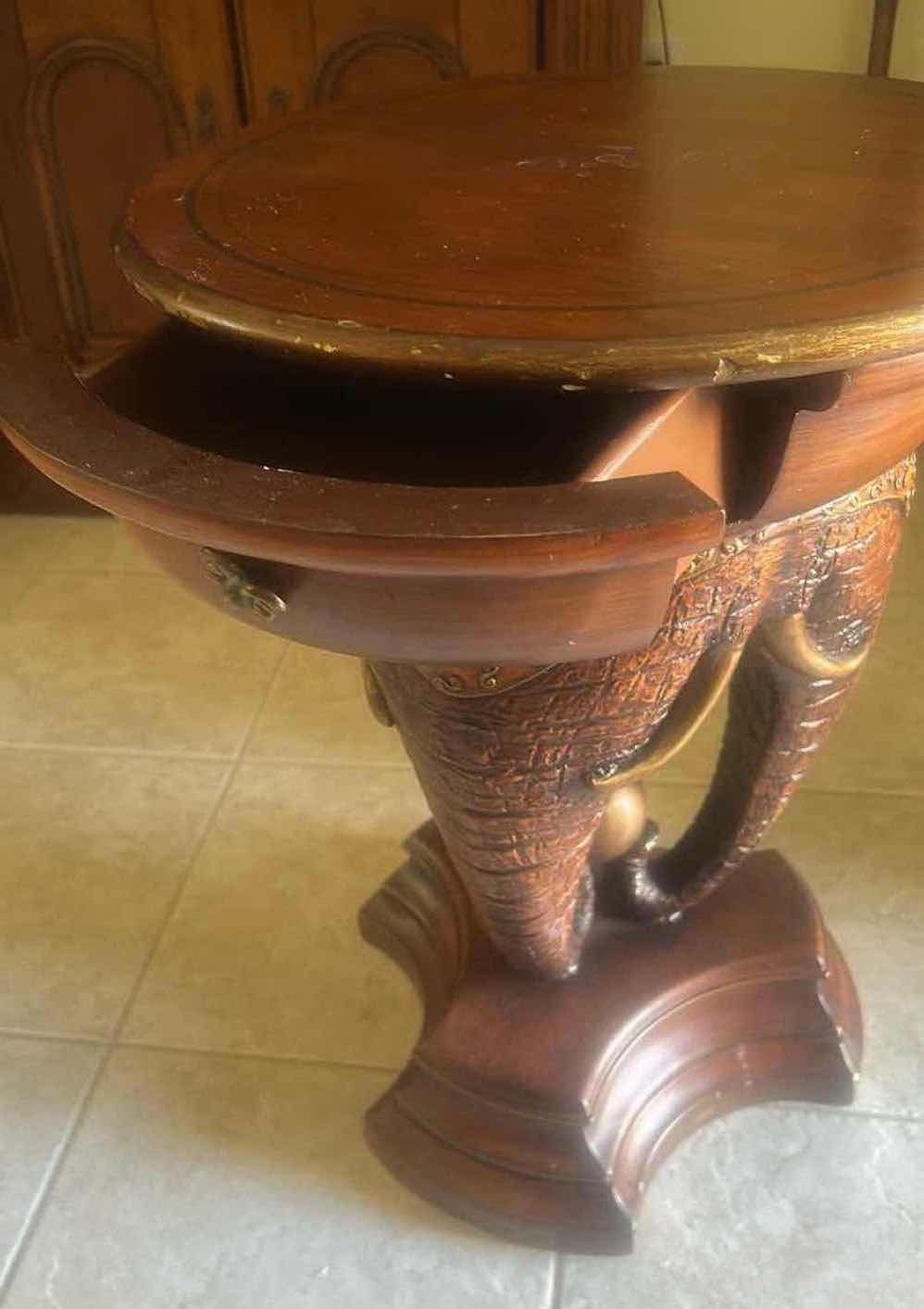 Photo 1 of EXOTIC ELEPHANT SIDE TABLE W ROUND TOP GOLD TRIM BASE DETAILED ELEPHANT TUSKS H 24"