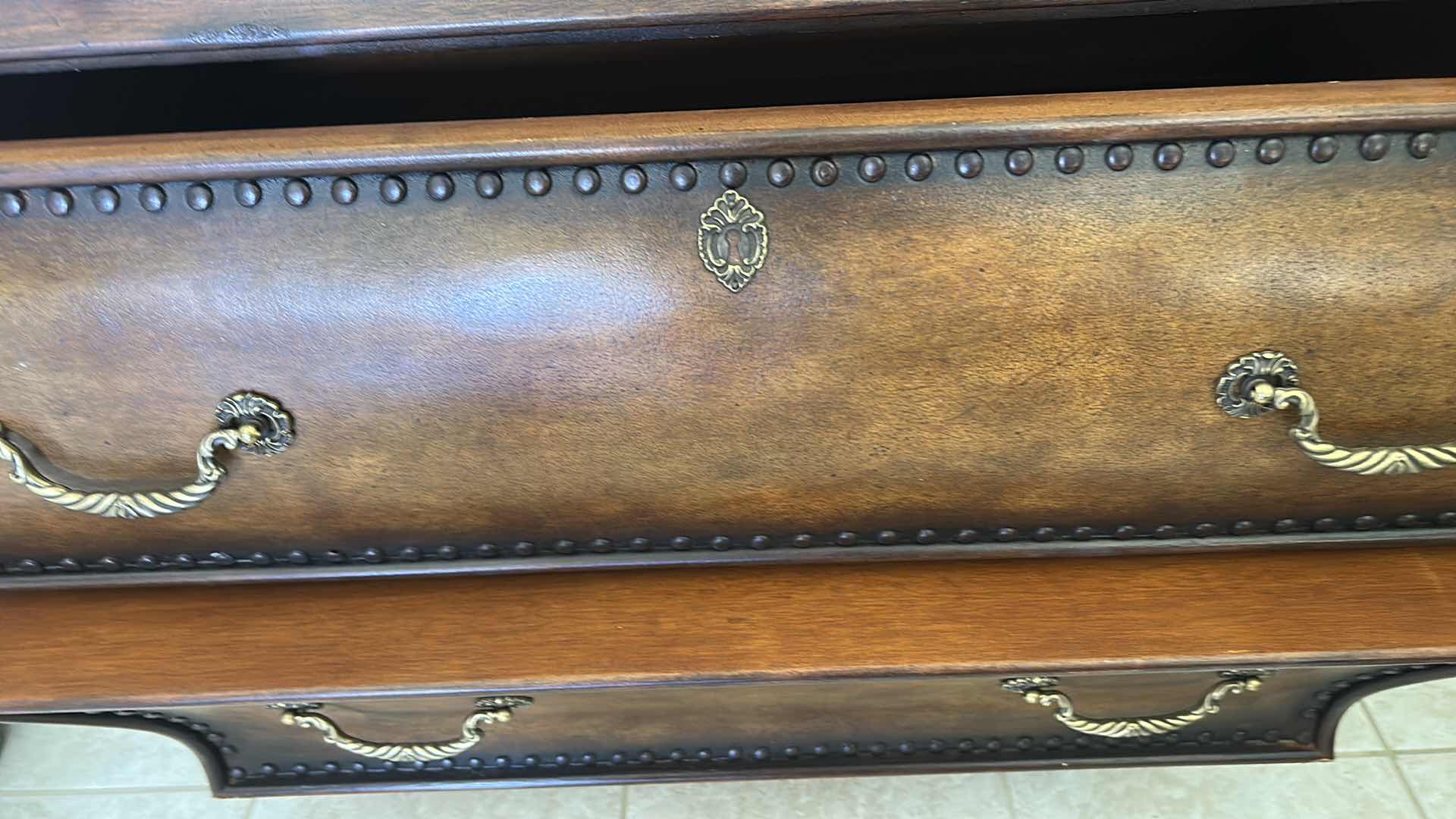 Photo 1 of THIS VINTAGE-STYLE BOMBAY CHEST FEATURES A DISTINCTIVE CURVED SILHOUETTE AND A DARK MARBLE TOP. 44“ x 22“ x H33 1/2“. $1500
