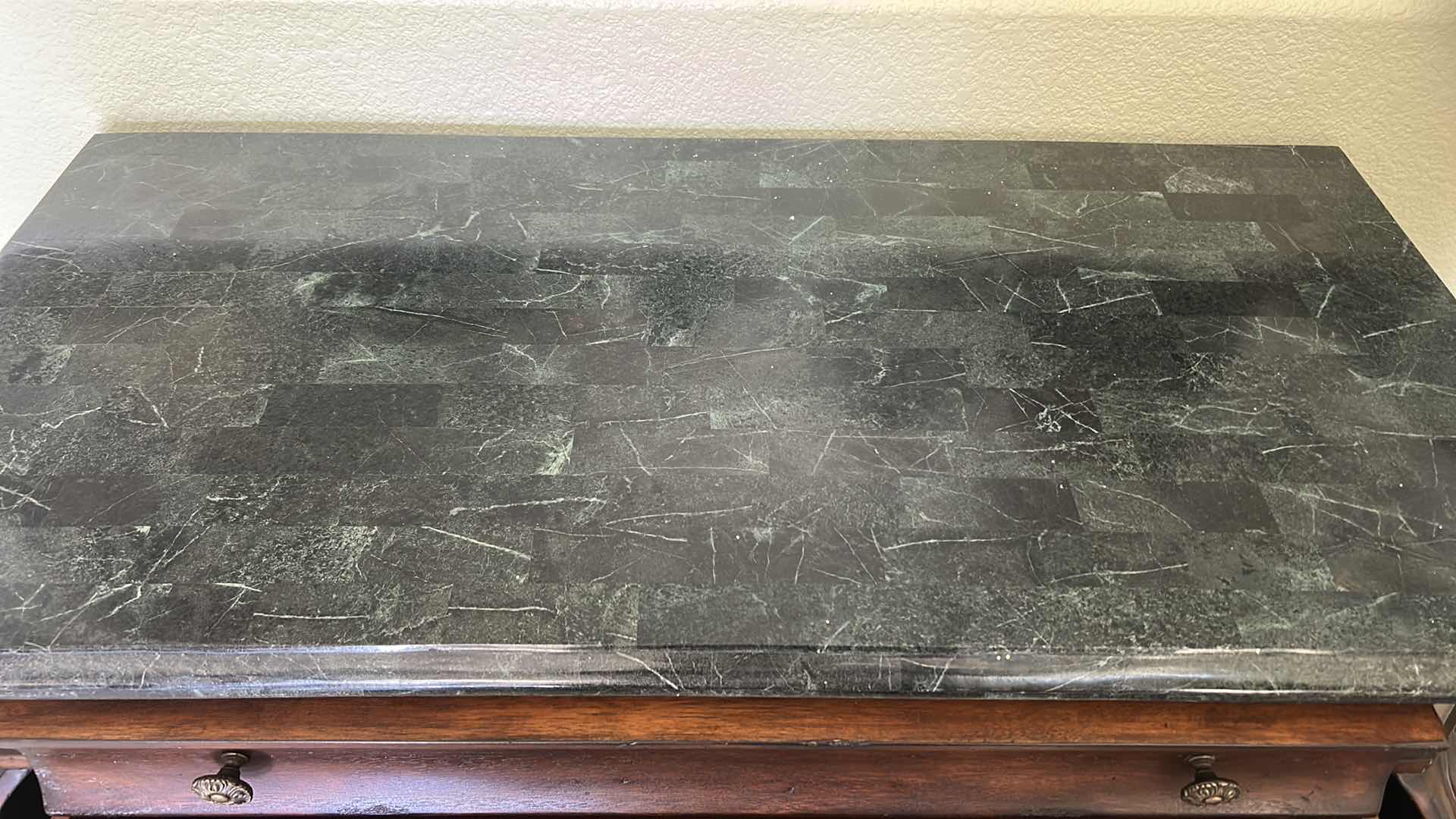 Photo 1 of THIS VINTAGE-STYLE BOMBAY CHEST FEATURES A DISTINCTIVE CURVED SILHOUETTE AND A DARK MARBLE TOP. 44“ x 22“ x H33 1/2“. $1500