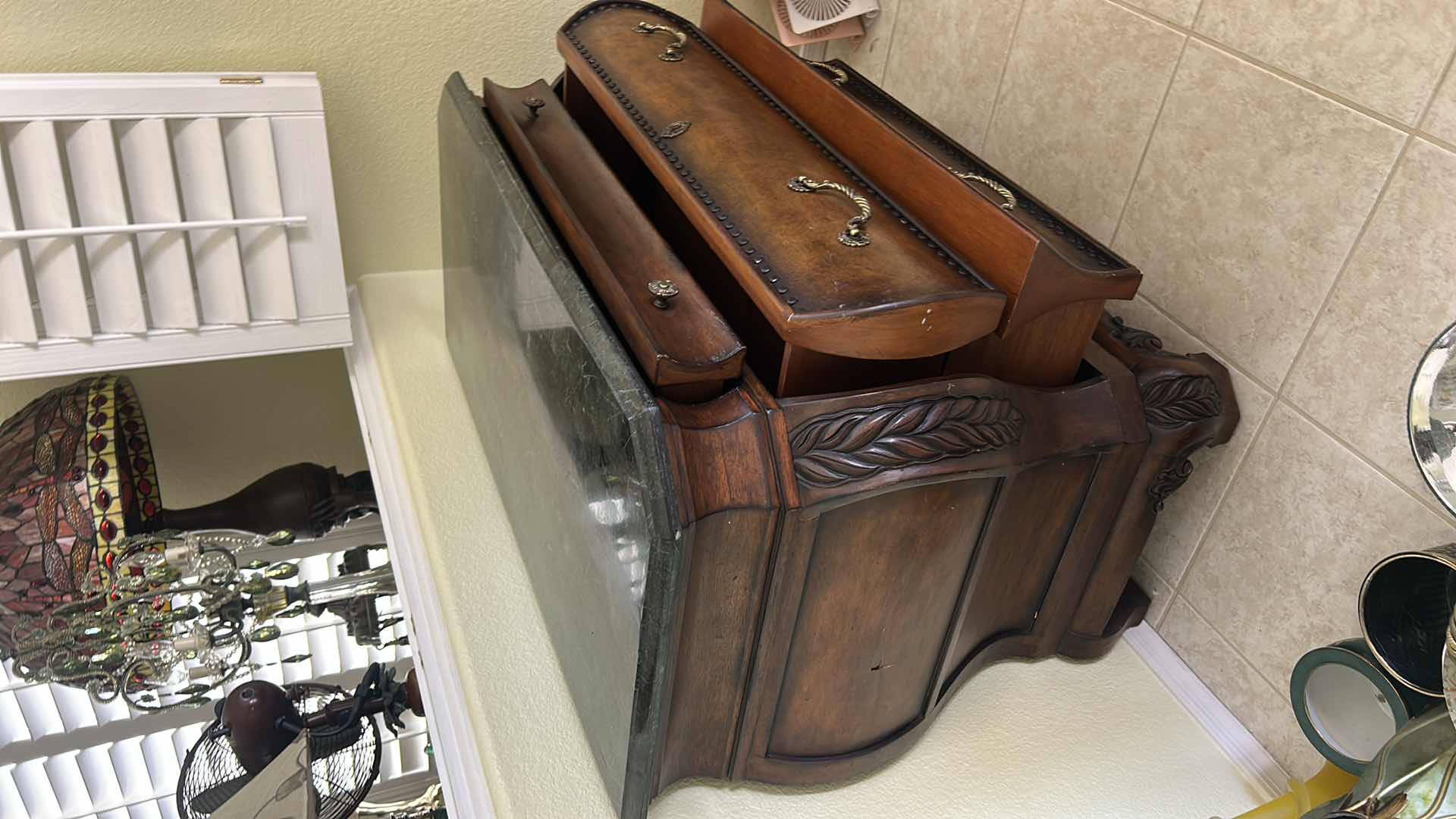 Photo 1 of THIS VINTAGE-STYLE BOMBAY CHEST FEATURES A DISTINCTIVE CURVED SILHOUETTE AND A DARK MARBLE TOP. 44“ x 22“ x H33 1/2“. $1500