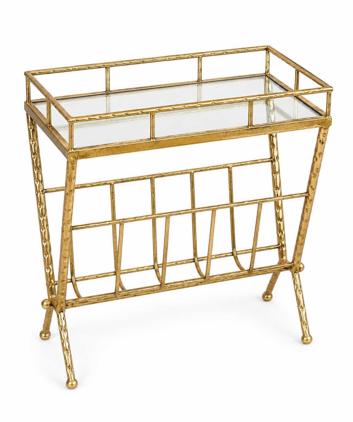 Photo 1 of VINTAGE-STYLE GOLD METAL MAGAZINE RACK FEATURING GLASS PANELS, A DECORATIVE HAMMERED FINISH, AND AN OPEN STORAGE COMPARTMENT 18 1/4“ x 12“ x H23“ $60