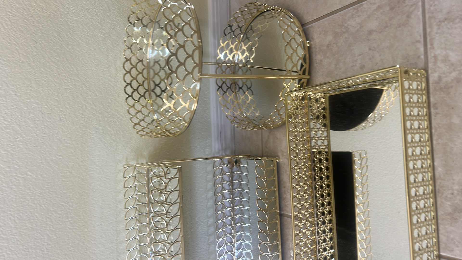 Photo 1 of SET OF GOLD METAL VANITY ORGANIZERS FEATURING MIRRORED TRAYS,