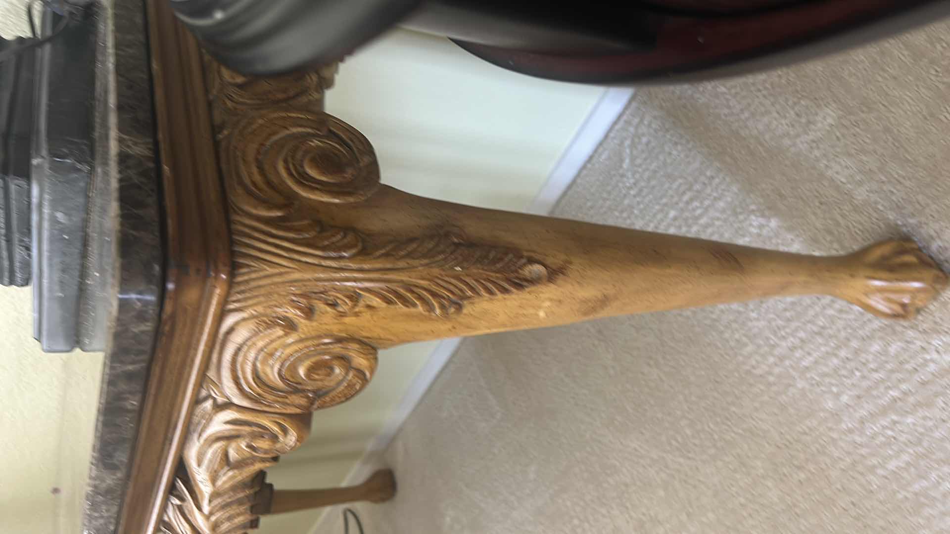 Photo 1 of LOUIS XV STYLE MARBLE TOP CENTER TABLE FEATURES A HEAVILY CARVED WOODEN BASE WITH SLENDER, SCROLLED CABRIOLE LEGS. 54“ x 21“ x H29 1/2“. $1500