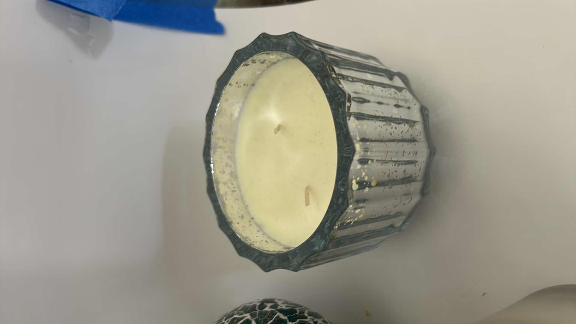 Photo 1 of MOSAIC CANDLE HOLDER LANTERN FEATURES A UNIQUE MIRROR GLASS DESIGN WITH A GOLD HANDLE, DECORATIVE CANDLES AND CANDLE HOLDER WITH  FLOWERS