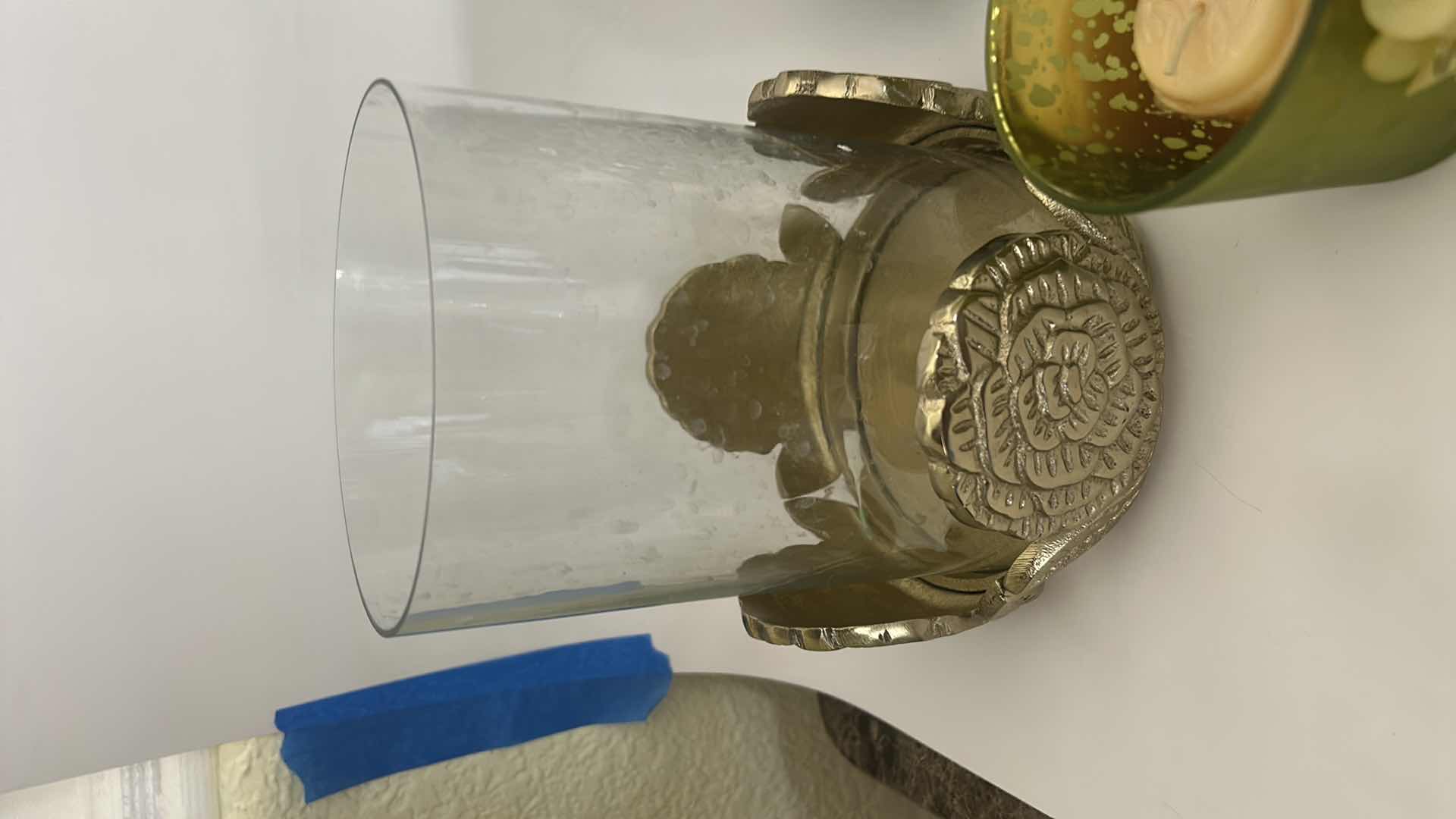 Photo 1 of MOSAIC CANDLE HOLDER LANTERN FEATURES A UNIQUE MIRROR GLASS DESIGN WITH A GOLD HANDLE, DECORATIVE CANDLES AND CANDLE HOLDER WITH  FLOWERS