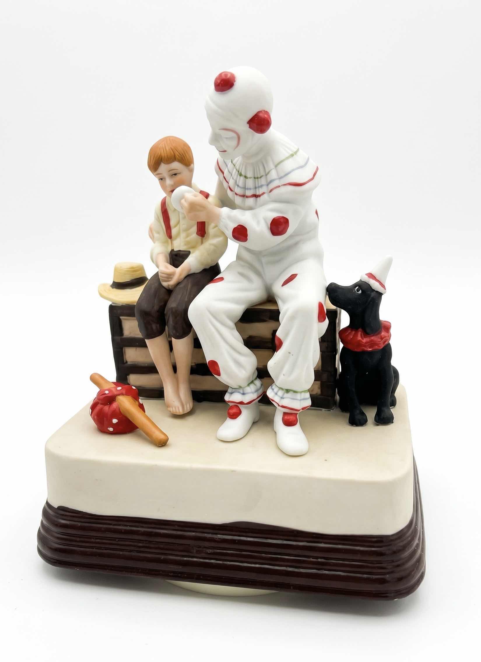 Photo 1 of VINTAGE 1985 PORCELAIN MUSIC BOX FIGURINE TITLED “THE RUNAWAY”, INSPIRED BY NORMAN ROCKWELL’S ARTWORK. H8”