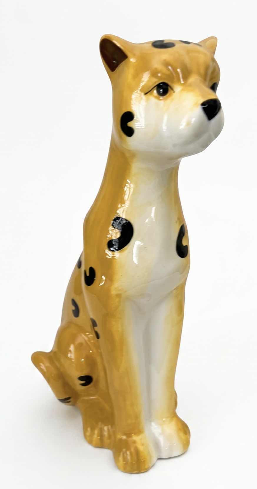 Photo 1 of CERAMIC CHEETAH FIGURINE FEATURES HAND-PAINTED DETAILS AND A GLOSSY FINISH. H13”