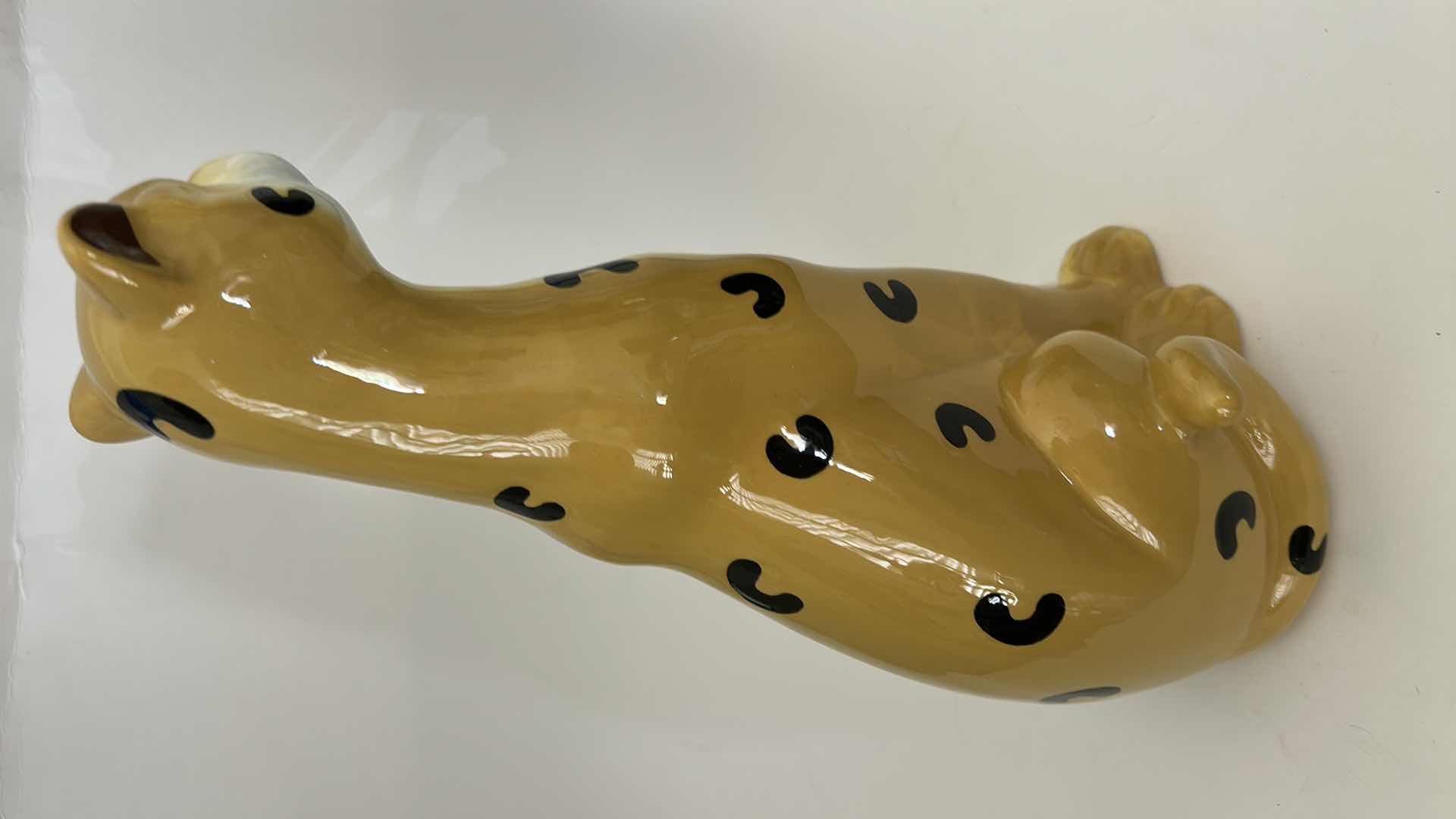 Photo 1 of CERAMIC CHEETAH FIGURINE FEATURES HAND-PAINTED DETAILS AND A GLOSSY FINISH. H13”