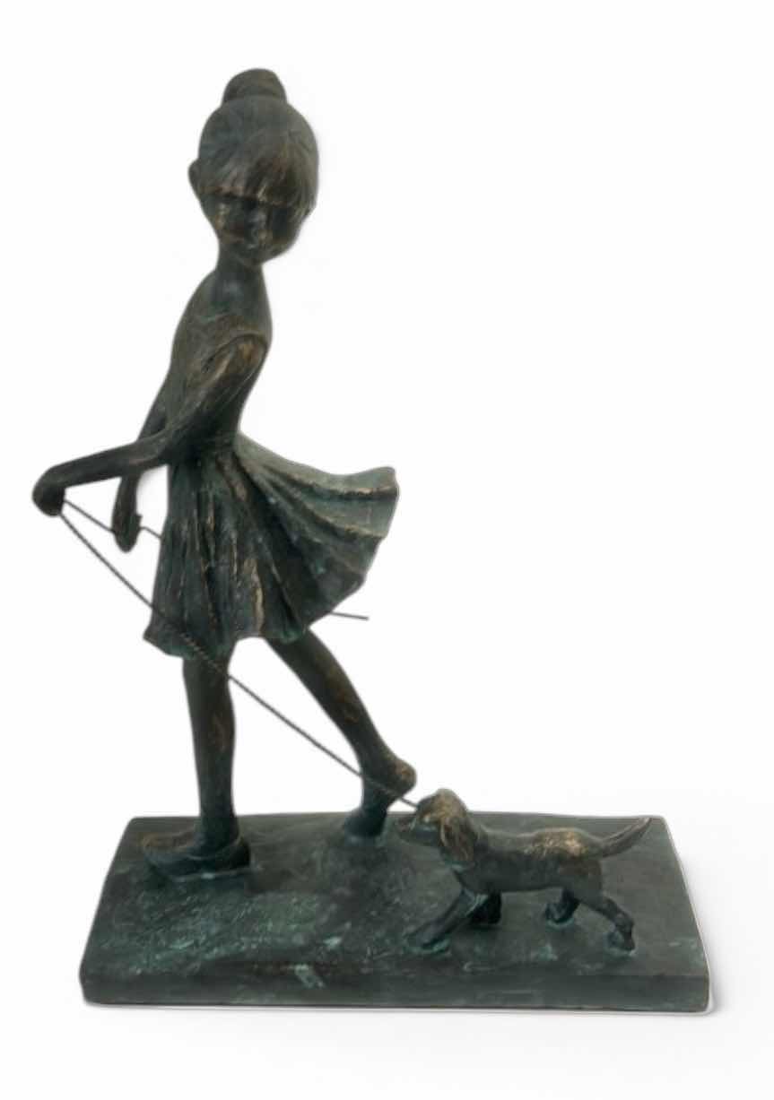 Photo 1 of ARTARIUM LLP “WALK OF LIFE” GIRL AND DOG FIGURINE IS MADE FROM POLYRESIN AND FEATURES A CHARMING PATINATED BRONZE FINISH. H11” $35