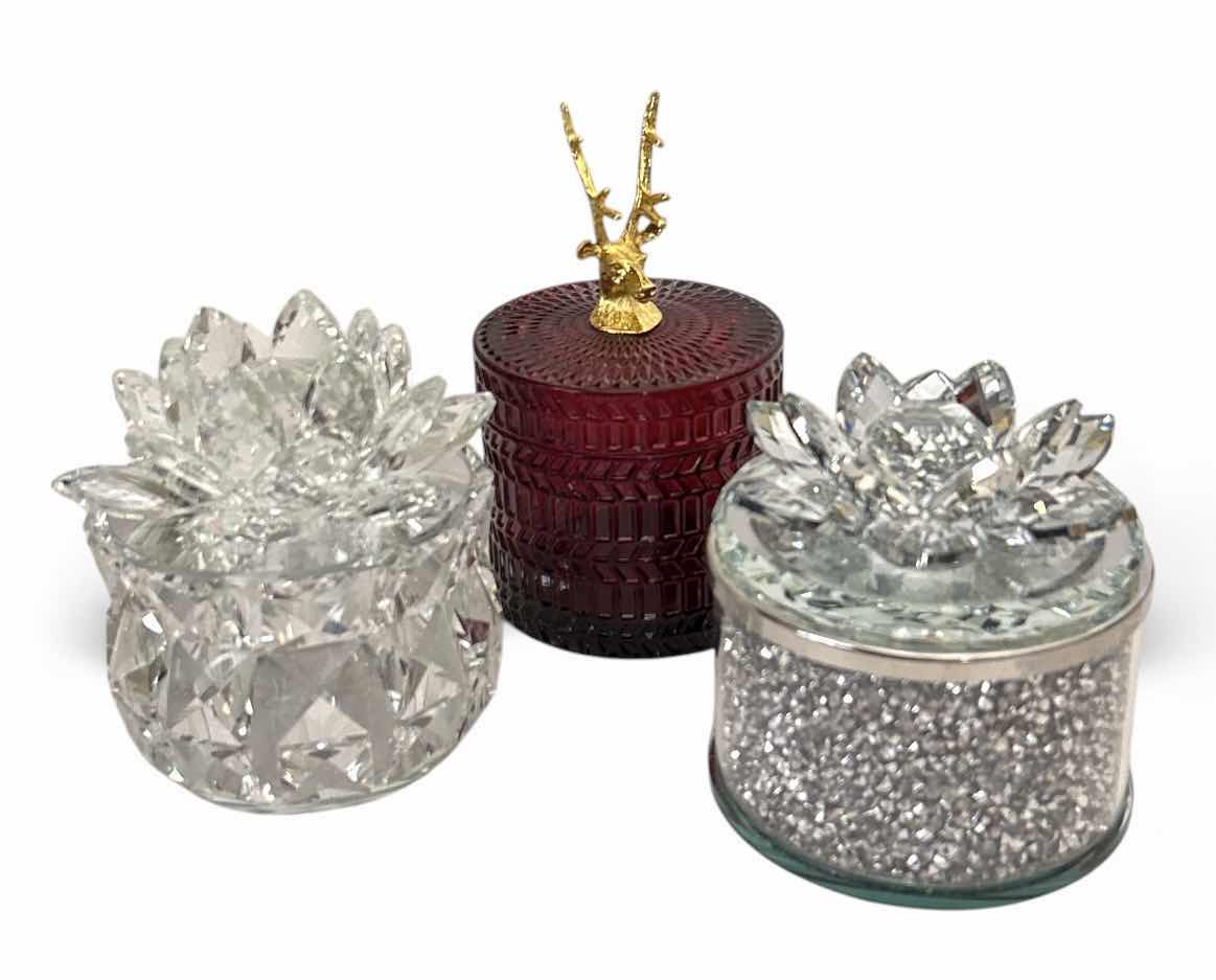 Photo 1 of SAGEBROOK HOME DECORATIVE BOXES FEATURE CRYSTAL LOTUS FLOWER LIDS AND GLITTER-FILLED OR FACETED GLASS BODIES FOR STORING SMALL TREASURES & RUBY-COLORED LVD GLASS TRINKET BOX FEATURES A DISTINCTIVE GOLD REINDEER TOPPER. $125
