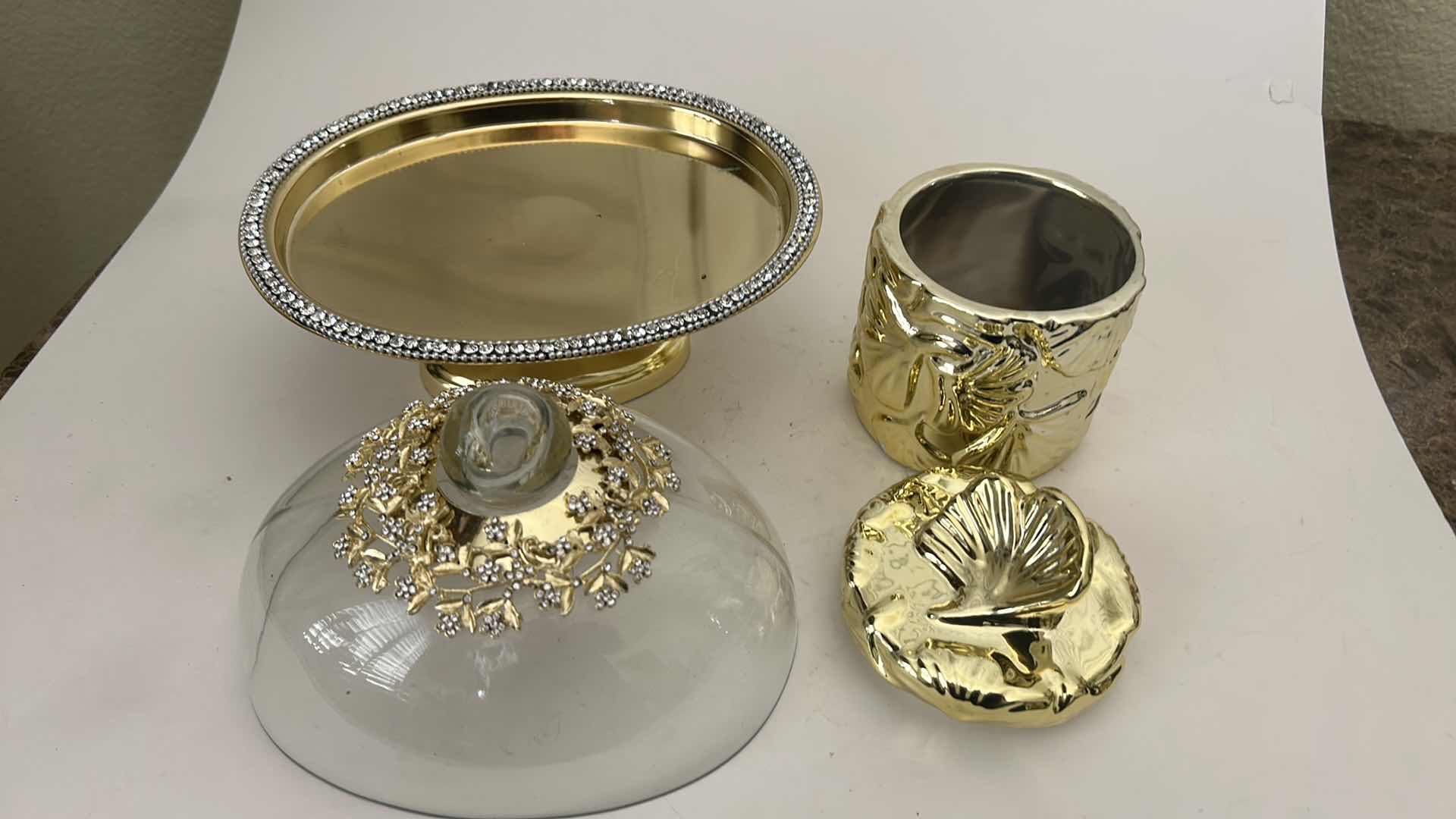 Photo 1 of CRYSTAL-ACCENTED GLASS DESSERT STAND H 7” & GOLD TONE LIDDED CANISTER WITH SHELL TOPPER