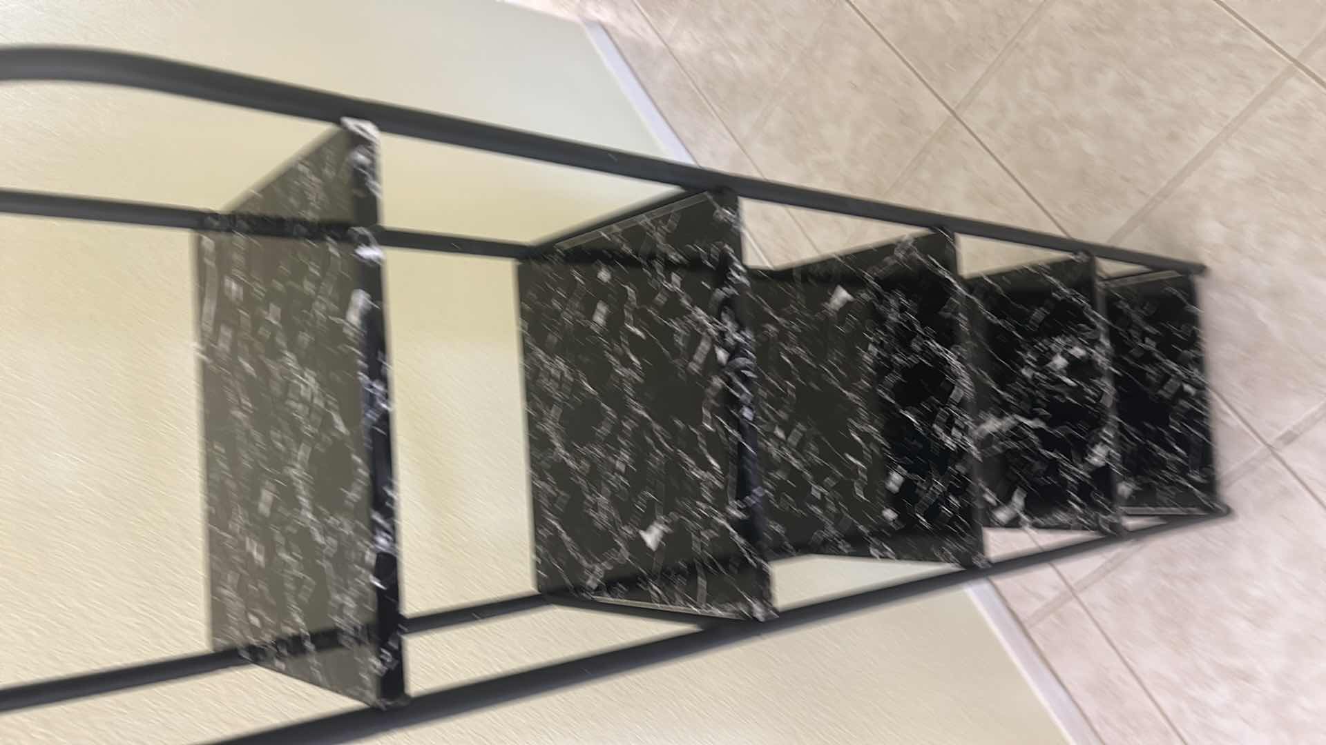 Photo 1 of 5-TIER RACK FEATURES A BLACK IMITATION MARBLE FINISH AND A LIGHTWEIGHT METAL FRAME. 13“ x 11“ x H55.5”