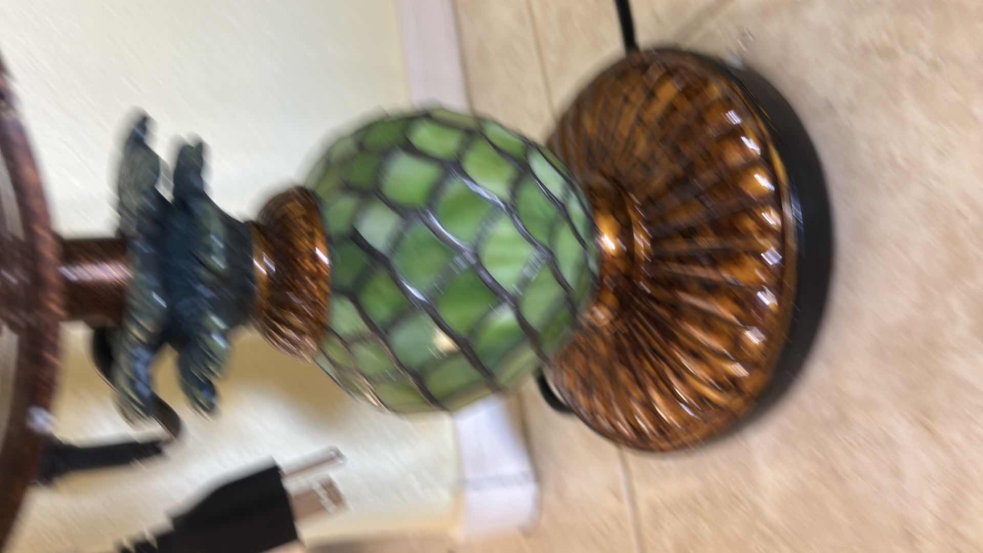 Photo 1 of DECOBREEZE PINEAPPLE FAN FEATURES A TIFFANY-STYLE GREEN MOSAIC GLASS BASE THAT DOUBLES AS A LAMP. H22” $200