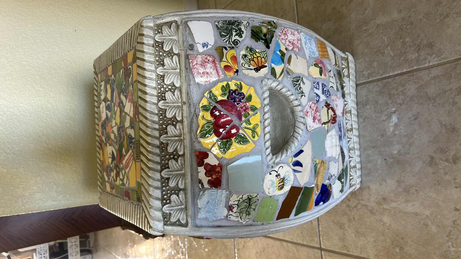 Photo 1 of MOSAIC CERAMIC GARDEN STOOL FEATURES A VIBRANT, ECLECTIC PATTERN OF COLORFUL POTTERY SHARDS ARRANGED IN A DECORATIVE MOSAIC DESIGN. H17”