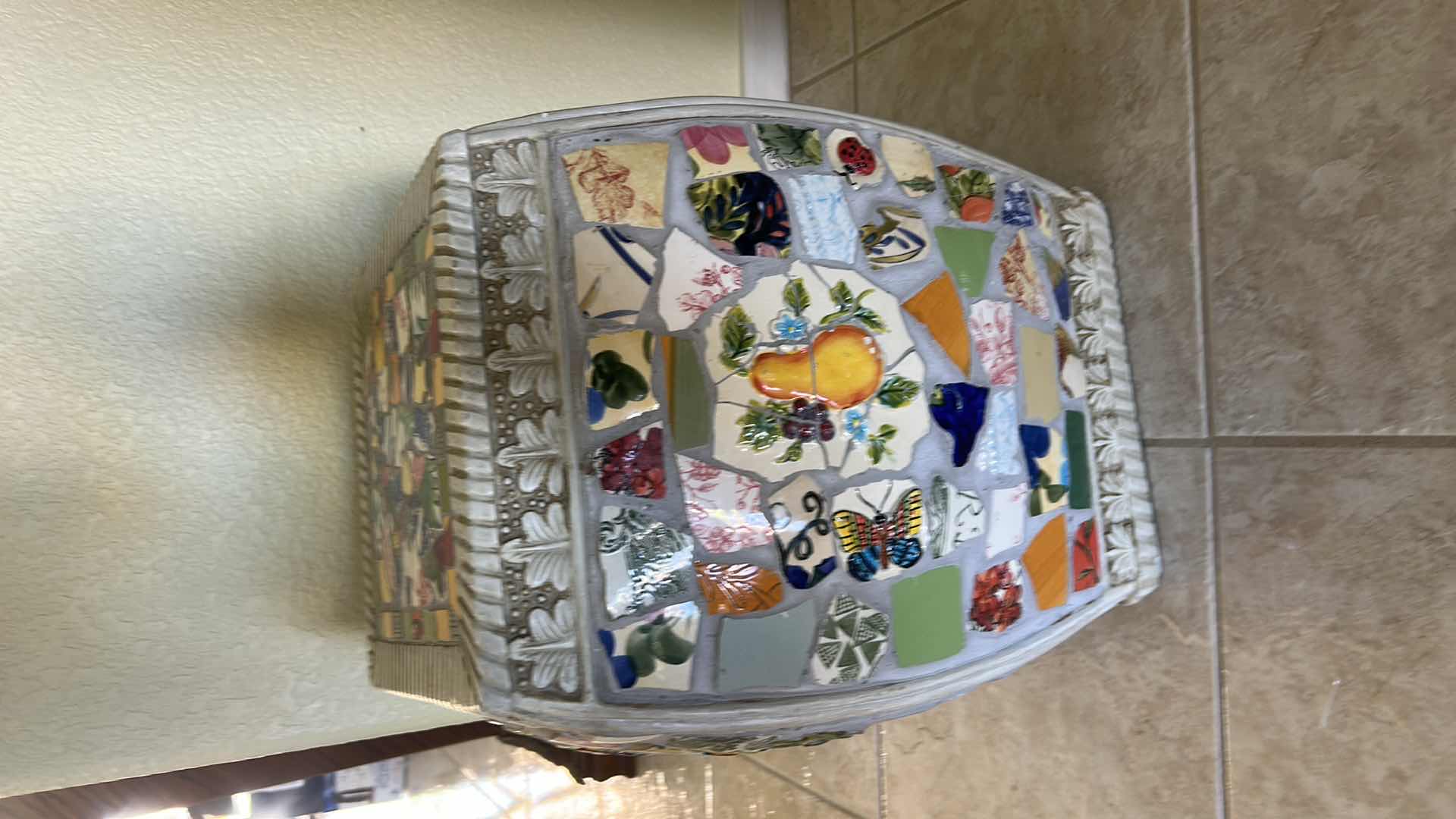 Photo 1 of MOSAIC CERAMIC GARDEN STOOL FEATURES A VIBRANT, ECLECTIC PATTERN OF COLORFUL POTTERY SHARDS ARRANGED IN A DECORATIVE MOSAIC DESIGN. H17”