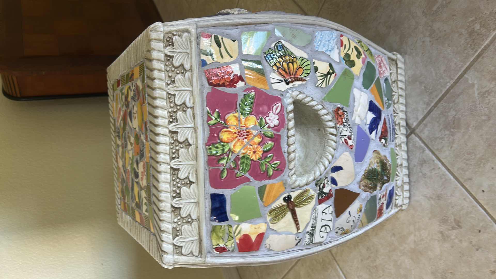 Photo 1 of MOSAIC CERAMIC GARDEN STOOL FEATURES A VIBRANT, ECLECTIC PATTERN OF COLORFUL POTTERY SHARDS ARRANGED IN A DECORATIVE MOSAIC DESIGN. H17”