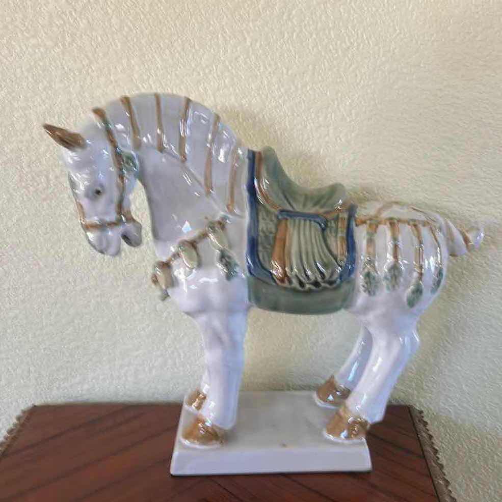 Photo 1 of PORCELAIN TANG HORSE STATUE, ORIENTAL DECOR PIECE FEATURING A WHITE CRACKLE GLAZE AND DETAILED BLUE AND GREEN SADDLERY. H13”
