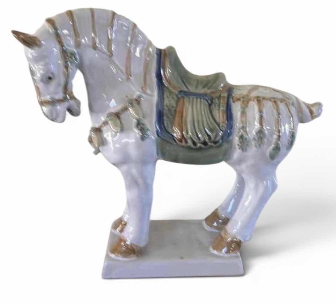 Photo 1 of PORCELAIN TANG HORSE STATUE, ORIENTAL DECOR PIECE FEATURING A WHITE CRACKLE GLAZE AND DETAILED BLUE AND GREEN SADDLERY. H13”