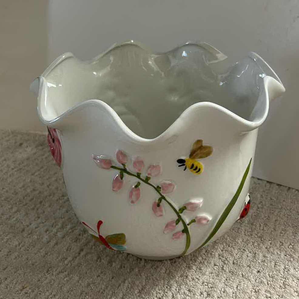 Photo 1 of WHITE CERAMIC PLANTER ARTWARE FEATURING A COLORFUL, HAND-PAINTED BUTTERFLY AND FLORAL DESIGN. 
10” x H9”