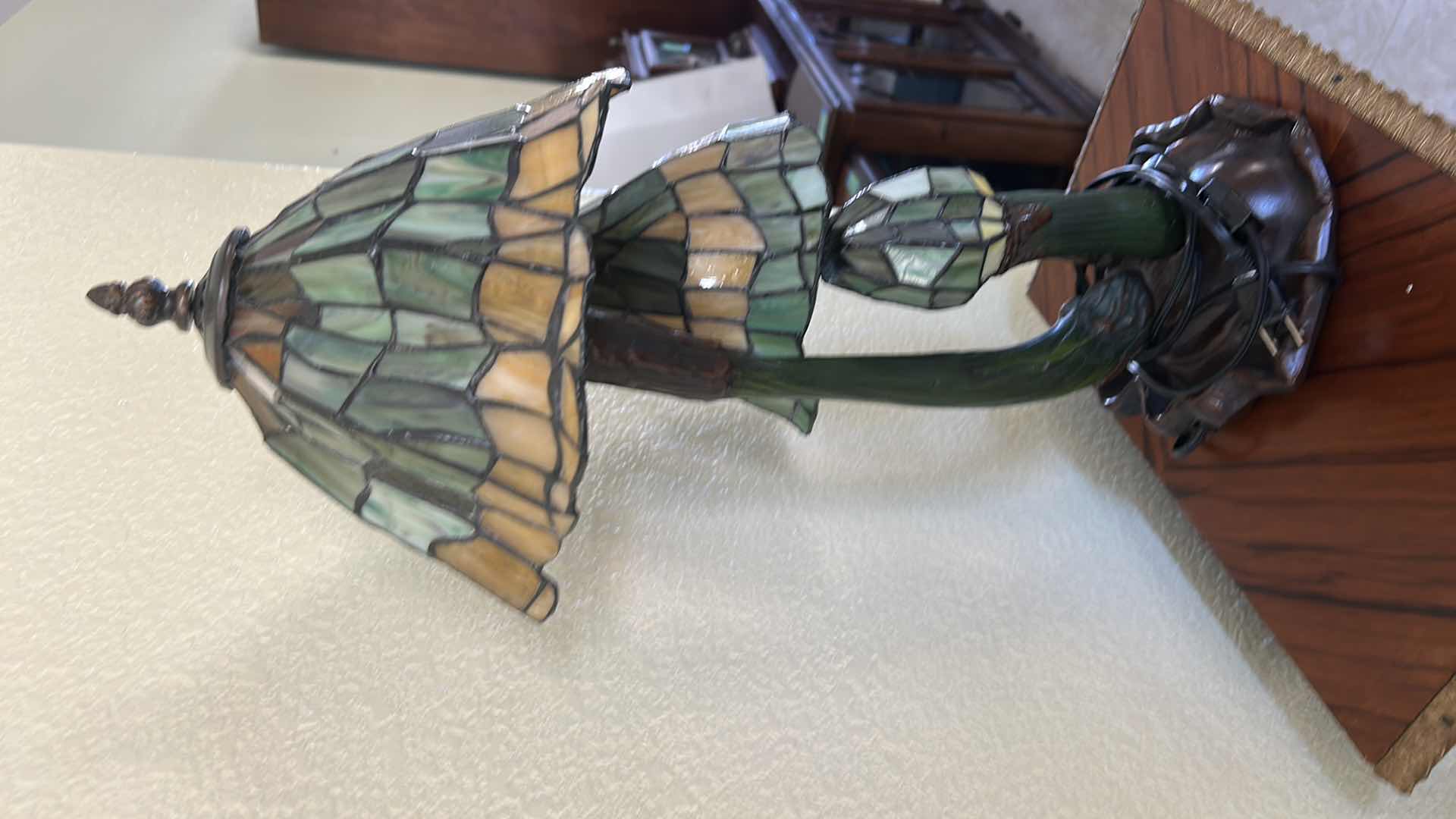 Photo 1 of 20TH-CENTURY ART NOUVEAU STYLE DESK LAMP FEATURING THREE MUSHROOM-SHAPED SHADES MADE OF STAINED GLASS IN GREEN AND AMBER TONES. H21” VALUE $200 to $1000