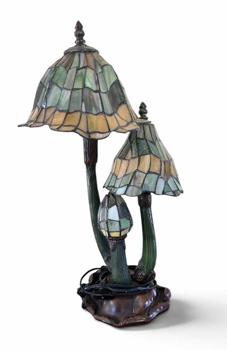 Photo 1 of 20TH-CENTURY ART NOUVEAU STYLE DESK LAMP FEATURING THREE MUSHROOM-SHAPED SHADES MADE OF STAINED GLASS IN GREEN AND AMBER TONES. H21” VALUE $200 to $1000