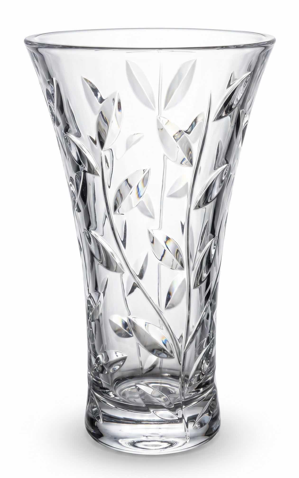 Photo 1 of ROYAL CRYSTAL ROCK LAURUS COLLECTION VASE FEATURES A DISTINCT CUT LEAF AND VINE DESIGN THROUGHOUT THE CLEAR CRYSTAL BODY. H11.75” $60