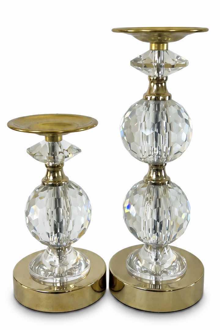 Photo 1 of 2- LOLA GOLD PILLAR CANDLEHOLDERS FROM TOUCH OF CLASS FEATURE FACETED CRYSTAL ACCENTS AND A POLISHED GOLD-FINISHED METAL BASE. (TALLEST H12”) $150