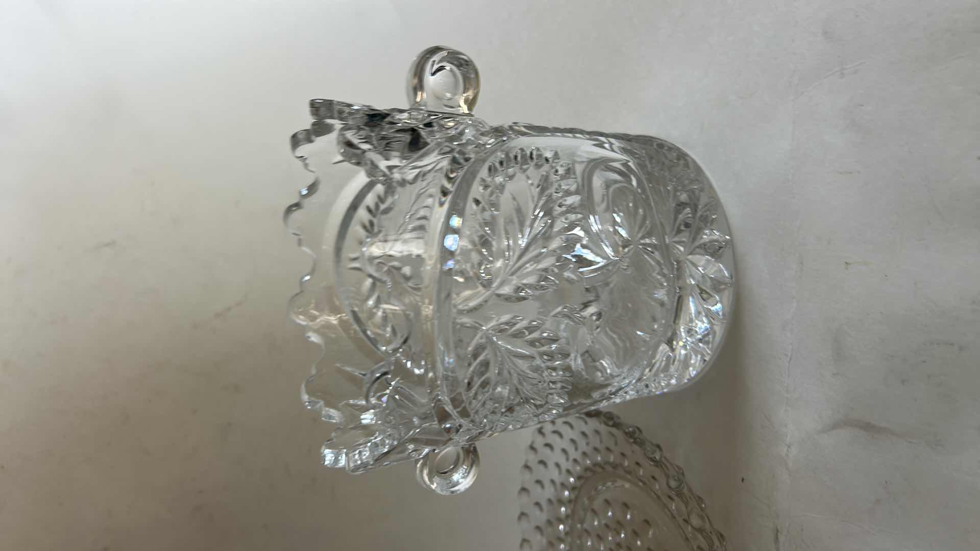 View 4 of VINTAGE CRYSTAL ICE BUCKET FEATURES AN INTRICATE ETCHED LEAF PATTERN AND SCALLOP-EDGED RIM & VINTAGE CLEAR GLASS DISH.