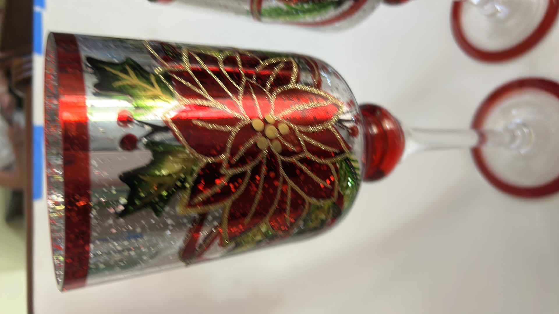 Photo 1 of TWO GLASS CHRISTMAS CANDLE HOLDERS (TALLEST H14”)