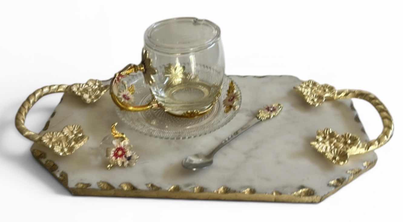 Photo 1 of VINTAGE-STYLE ENAMEL GLASS FLORAL TEA CUP FEATURES INTRICATE 3D BUTTERFLY AND ROSE DETAILS ON THE HANDLE AND LID & HANDMADE SERVING TRAY FEATURES A WHITE MARBLE BASE ACCENTED WITH INTRICATE GOLD-FINISHED METAL HANDLES.