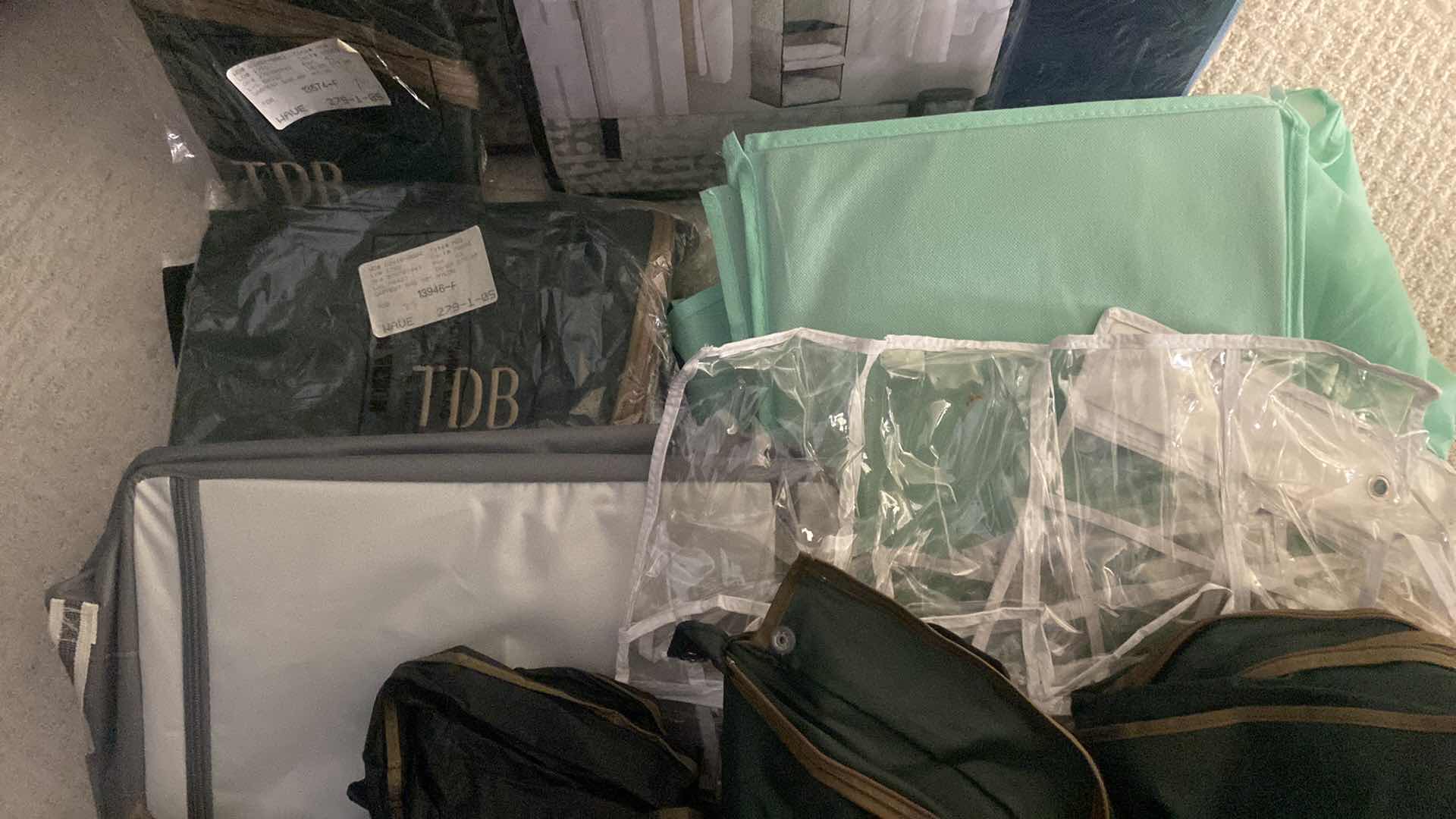 Photo 1 of CLOSET ORGANIZERS & GARMENT BAGS
