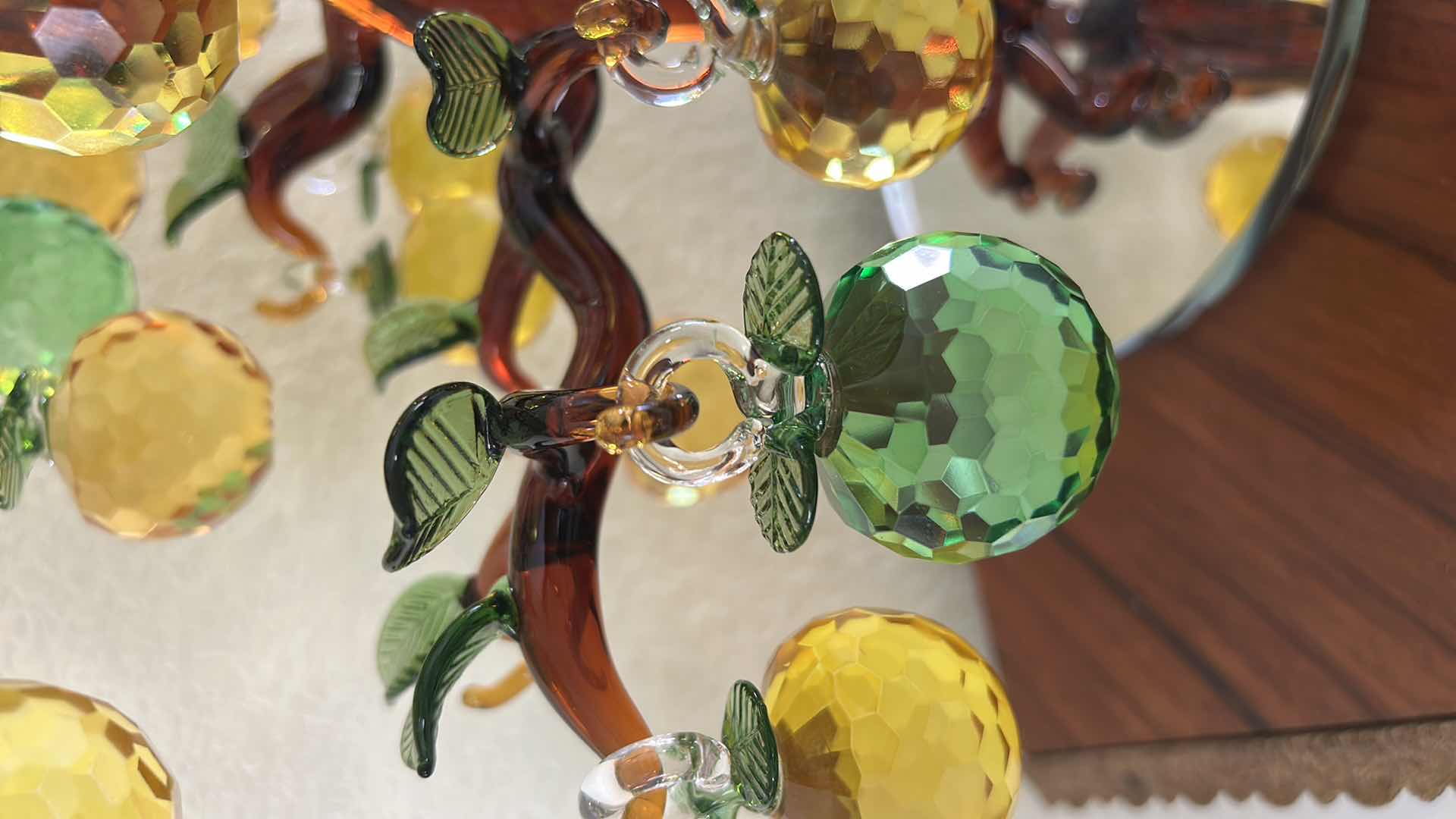 Photo 1 of YU FENG BRAND ARTIFICIAL CRYSTAL APPLE TREE FEATURES GOLDEN AND GREEN FACETED GLASS FRUITS HANGING FROM A SCULPTED BROWN GLASS TRUNK. H17”