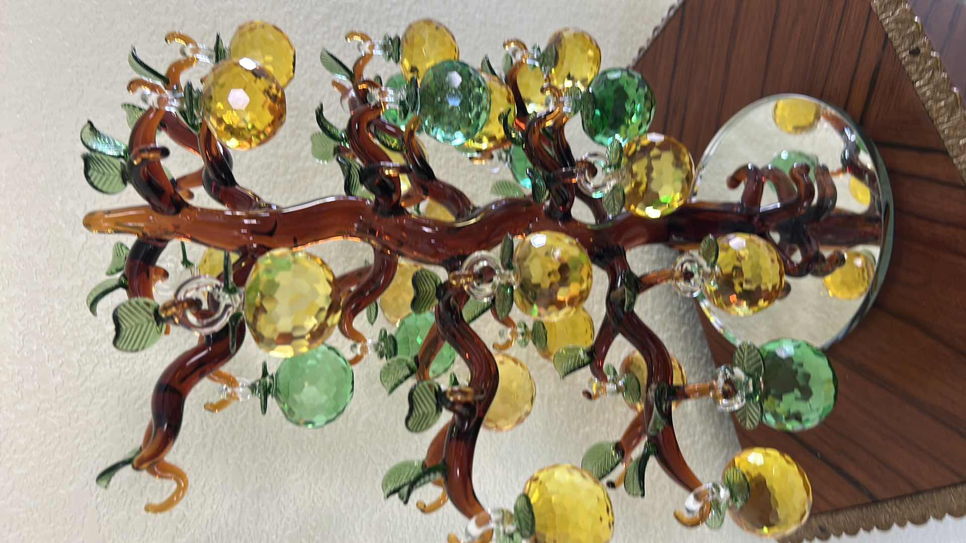 Photo 1 of YU FENG BRAND ARTIFICIAL CRYSTAL APPLE TREE FEATURES GOLDEN AND GREEN FACETED GLASS FRUITS HANGING FROM A SCULPTED BROWN GLASS TRUNK. H17”