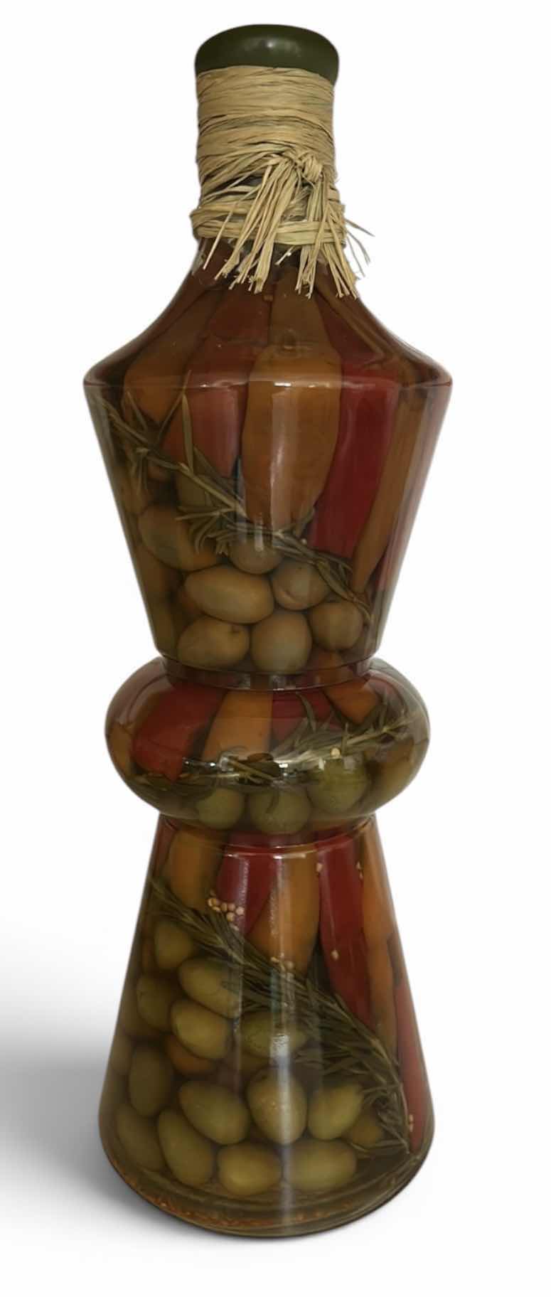 Photo 1 of DECORATIVE GLASS BOTTLE FEATURES STACKED LAYERS OF PRESERVED OLIVES, PEPPERS, AND HERBS. H17”