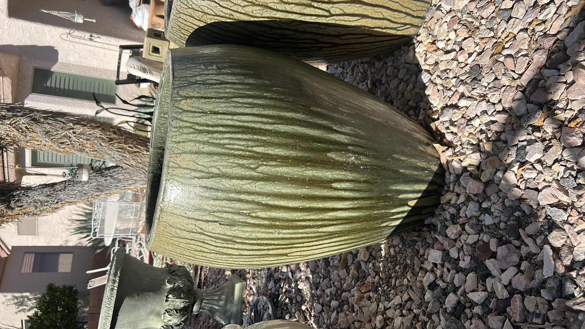 View 2 of ANTIQUE DRIP PLANTER FEATURES A YELLOW-GREEN FINISH WITH A RUSTIC DRIP DESIGN. H23” $600