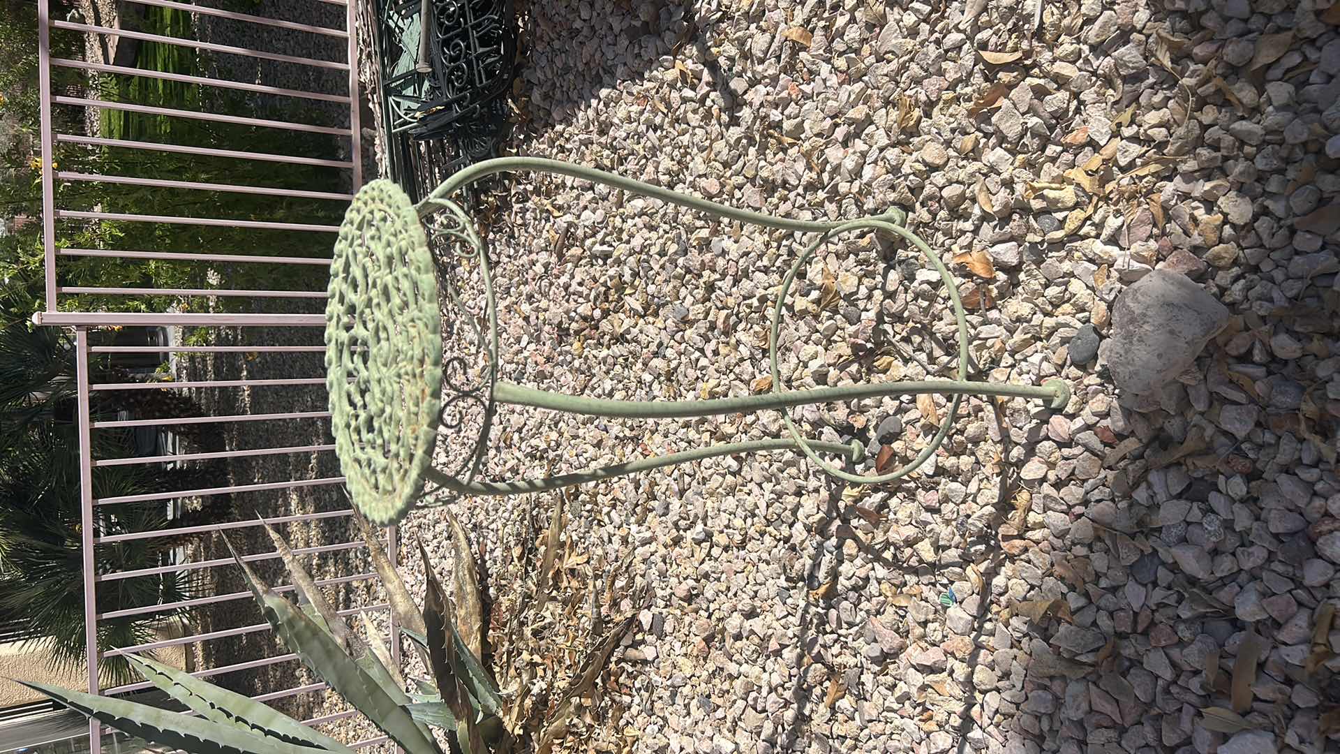 Photo 1 of OUTDOOR METAL TABLE WITH GREEN PATINA AND ANGEL STATUE