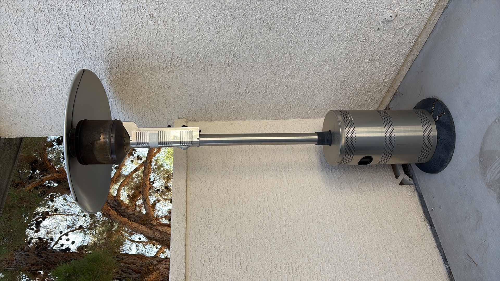 Photo 1 of STAINLESS STEEL FREESTANDING PROPANE PATIO HEATER WITH REFLECTOR SHIELD AND CYLINDER ENCLOSURE H85”