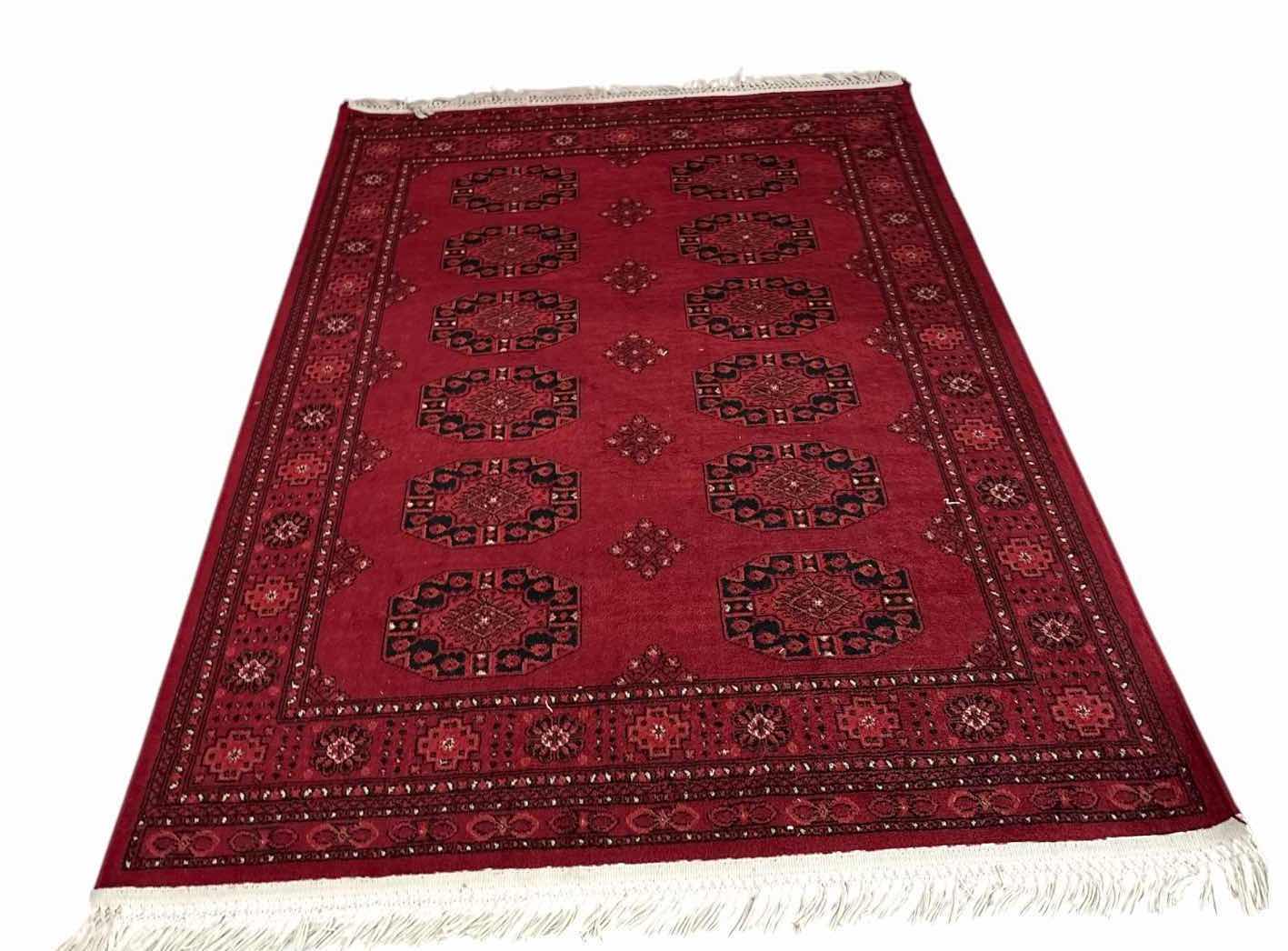 Photo 1 of LOOM BOKHARA COLLECTION RED TRADITIONAL AREA RUG, MADE IN TURKEY, WITH FRINGED ENDS AND POLYPROPYLENE PILE 6”X9’