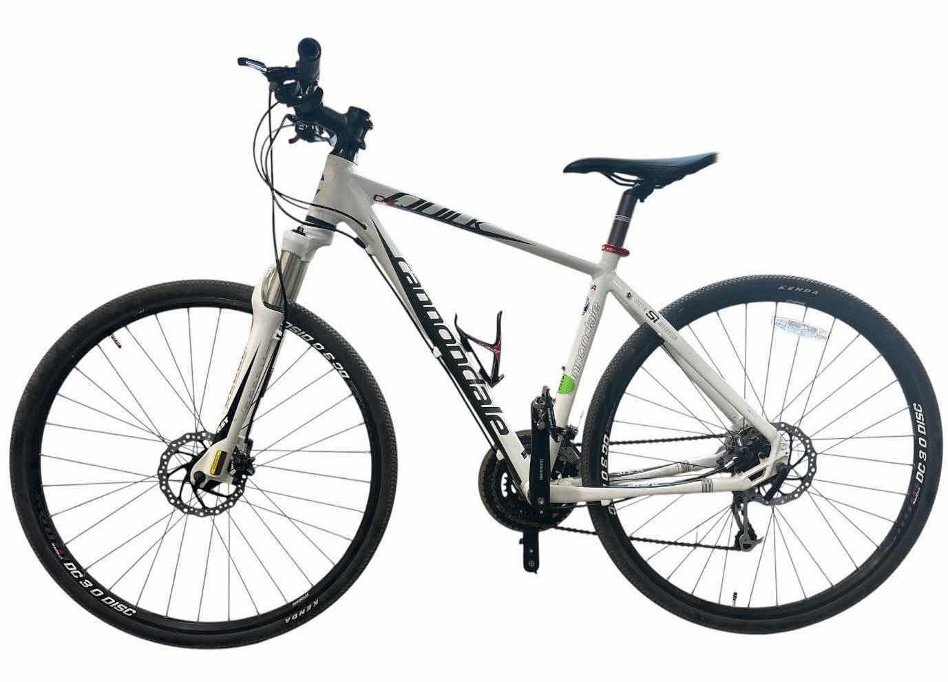 Photo 1 of CANNONDALE QUICK 48CM (XS)ALUMINUM HYBRID BICYCLE WITH 700C WHEELS, FRONT SUSPENSION, SHIMANO DRIVETRAIN, MECHANICAL DISC BRAKES, AND WATER BOTTLE CAGE TOTAL H42”