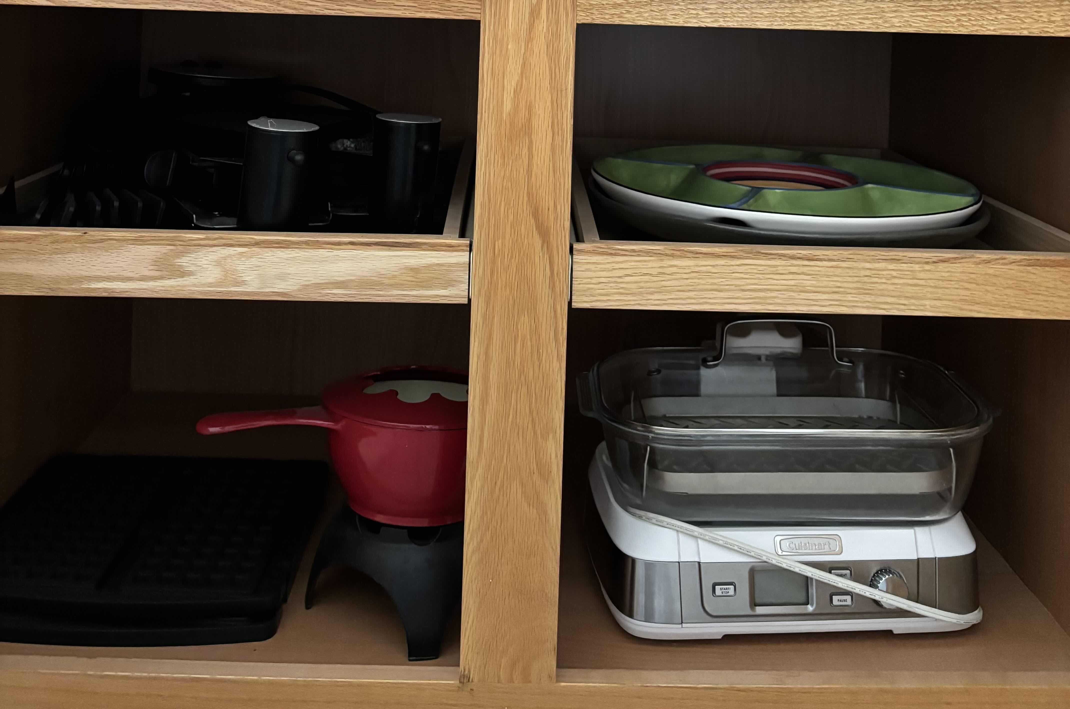 Photo 1 of CONTENTS OF KITCHEN CABINET