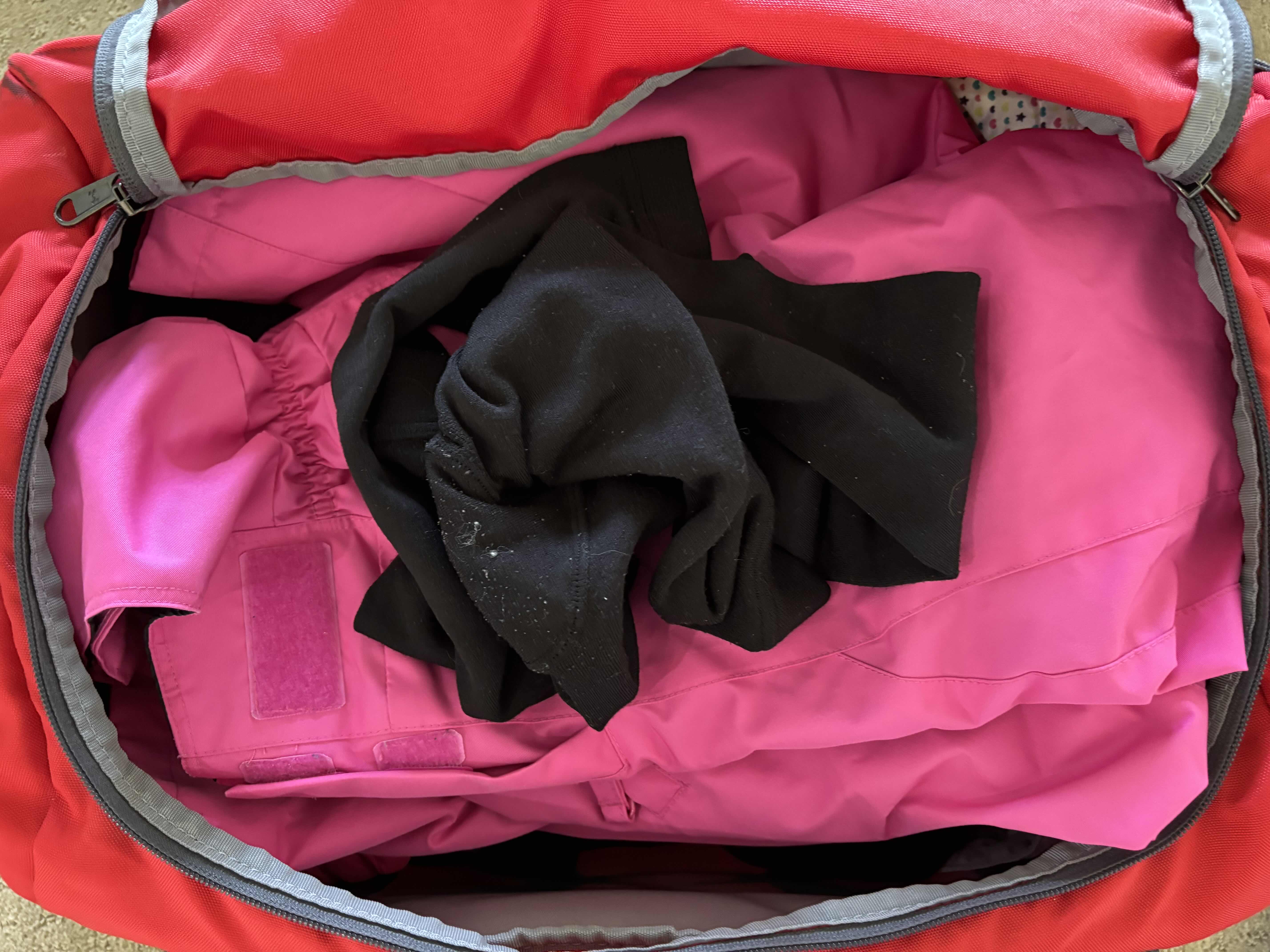 Photo 1 of UNDER ARMOUR DUFFLE BAG FULL OF SNOW GEAR FOR LITTLE GIRLS SIZE 130