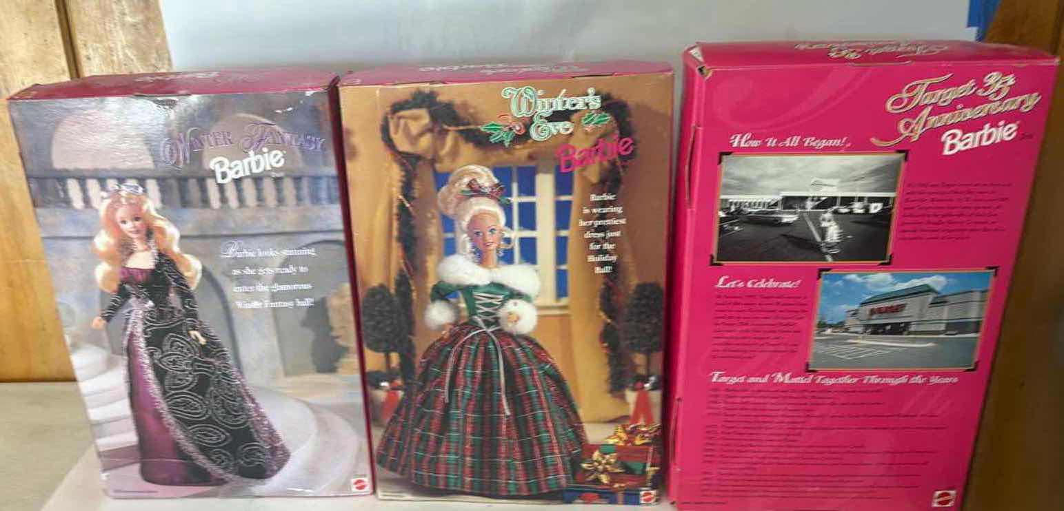 Photo 1 of 3- NIB WINTER BARBIES $80