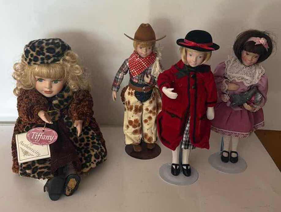 Photo 1 of 4- NEW PORCELAIN DOLLS