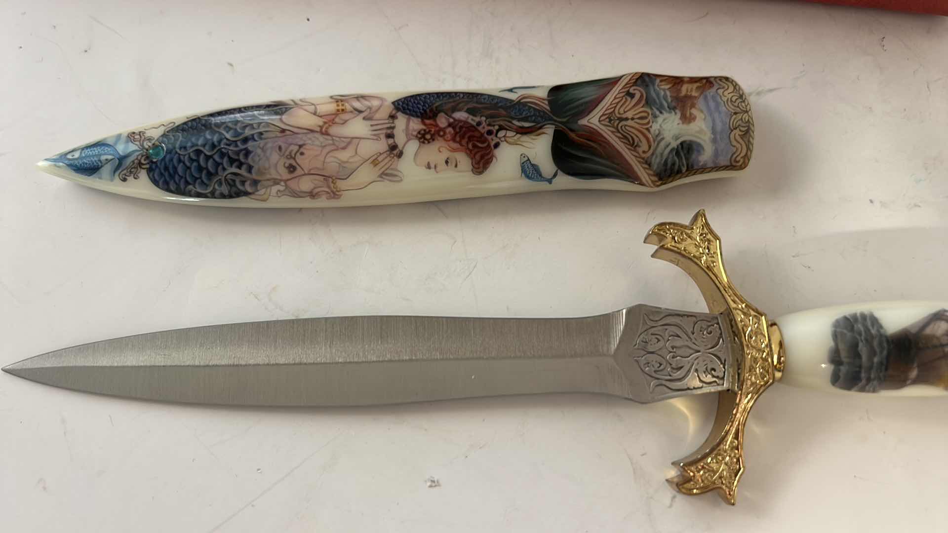 Photo 1 of DECORATIVE SUNKEN TREASURES FANTASY DISPLAY DAGGER WITH PAINTED MERMAID, H12.25”