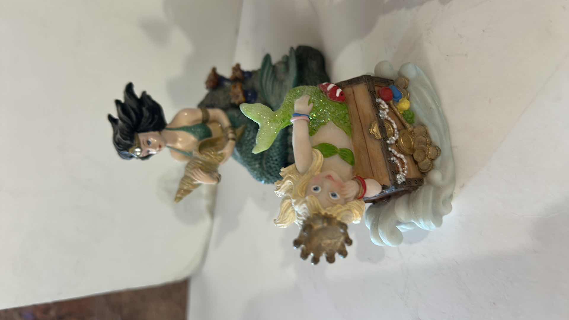 Photo 1 of 10 - SMALL MERMAID FIGURINES AND ONE SHELL.
