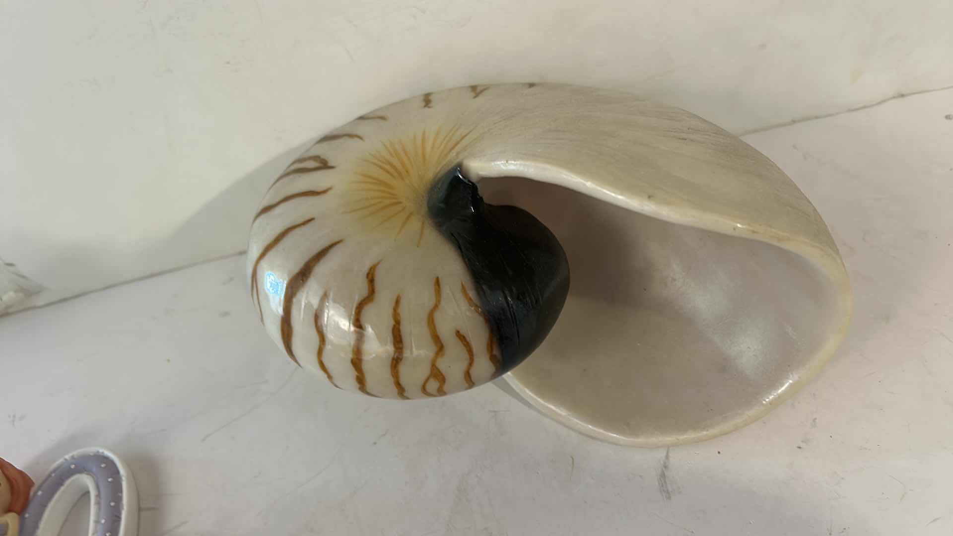 Photo 1 of 10 - SMALL MERMAID FIGURINES AND ONE SHELL.