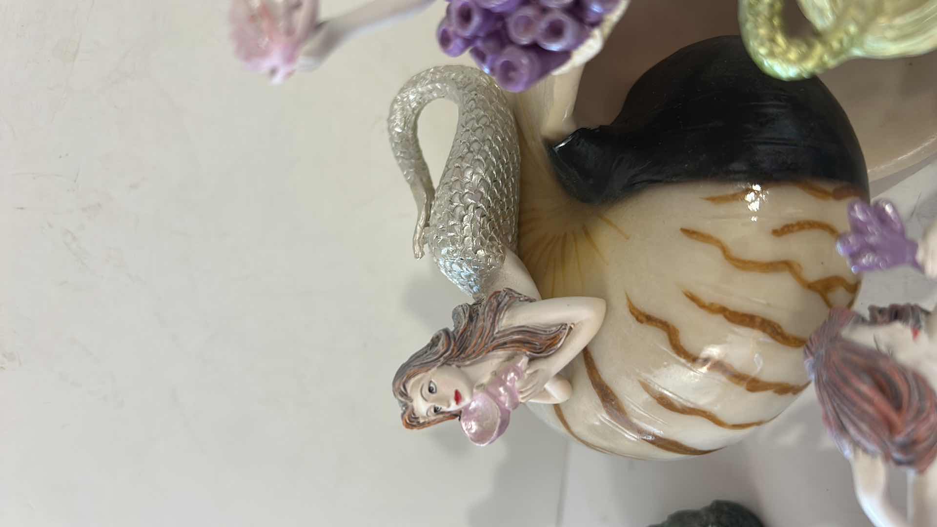 Photo 1 of 10 - SMALL MERMAID FIGURINES AND ONE SHELL.