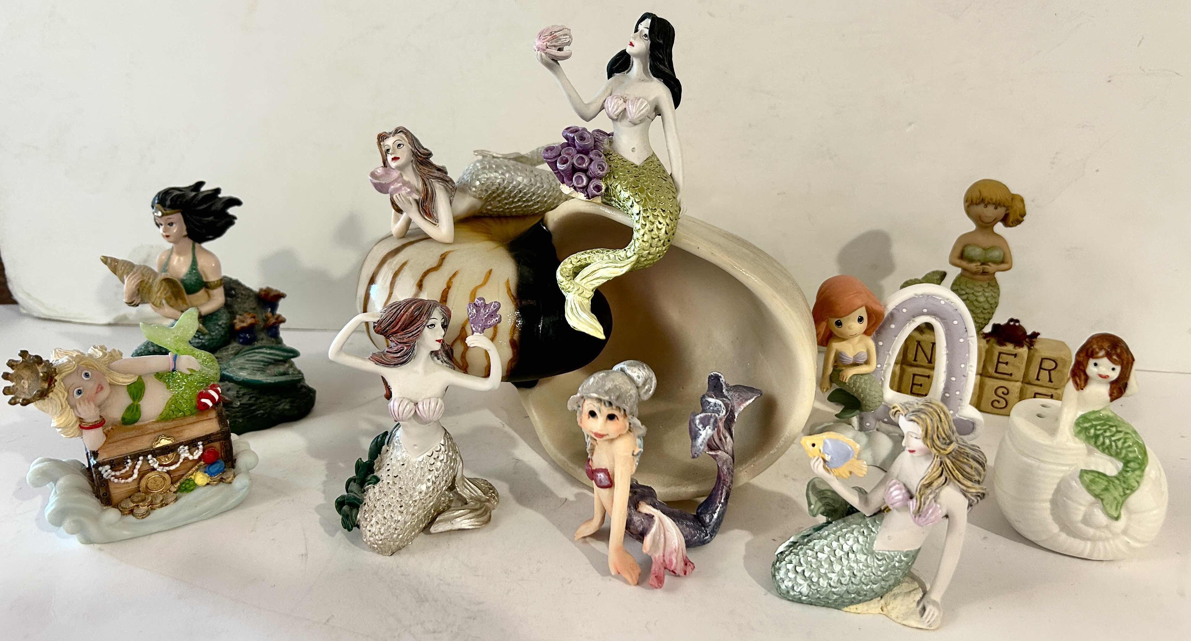 Photo 1 of 10 - SMALL MERMAID FIGURINES AND ONE SHELL.